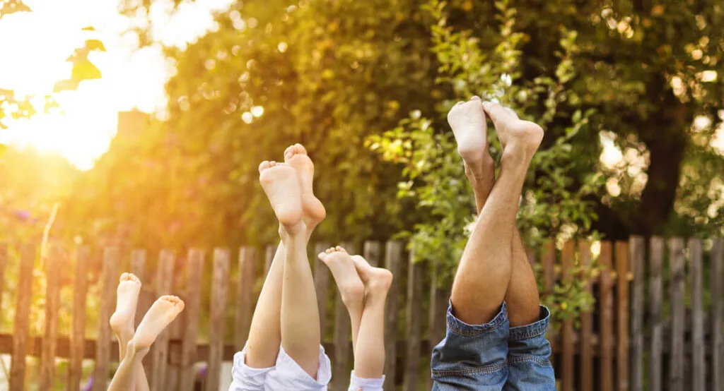 whole family elevating their feet for joy and happiness